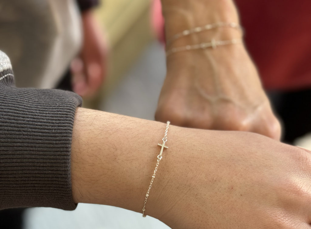 Women wearing lasting permanent bracelets by EverJoy in Indianapolis—timeless expressions of enduring style. Embrace the beautiful jewelry and  wear it forever.
